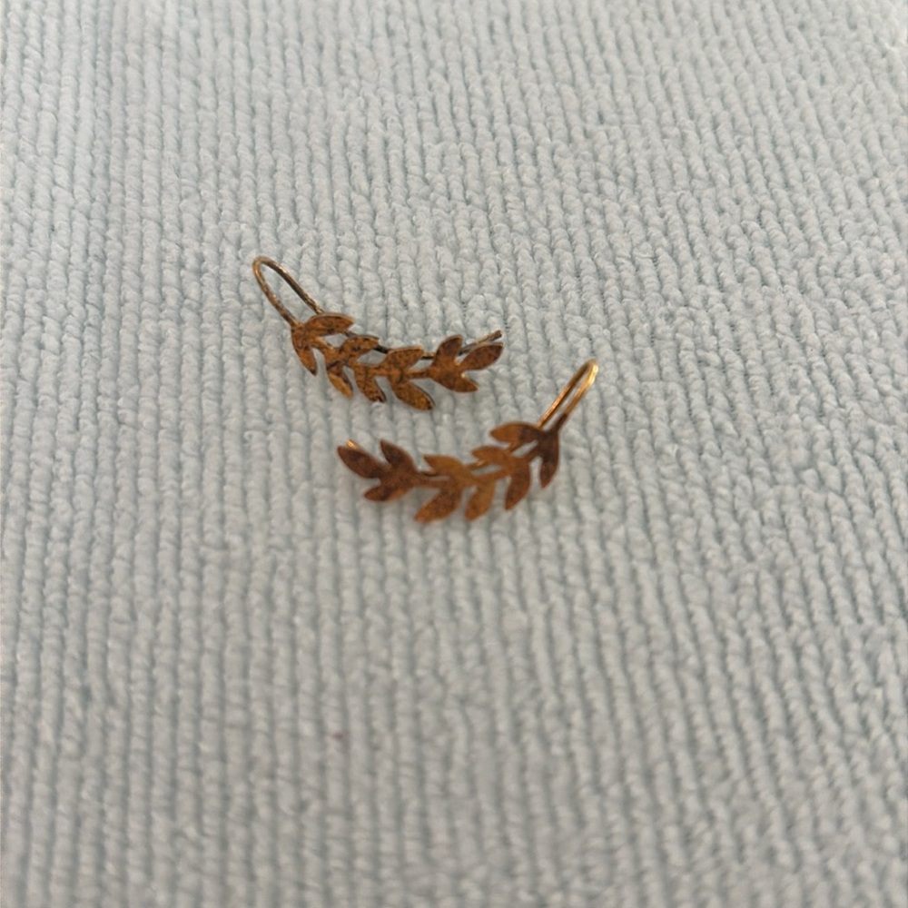 Noonday Collection ear climber earrings gold leaf design pierced ears